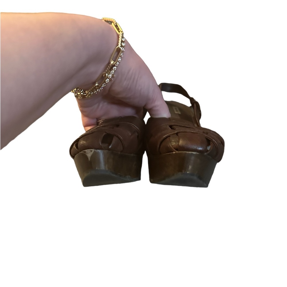 Miu Miu brown leather wooden fisherman’s sandal wedge